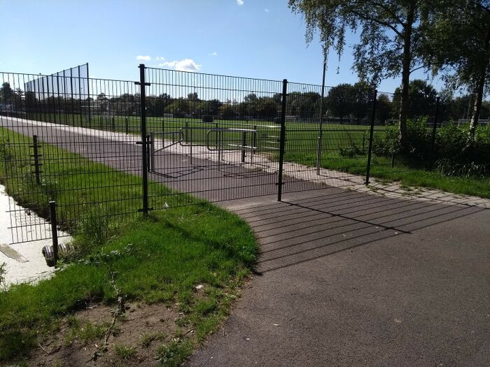 Fence crossing a highway.jpg