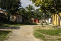 unpaved residential road, almost a track; highway=residential; paved=no